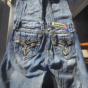 Rock Revival Blue Boot Cut Jeans with White Stitching
